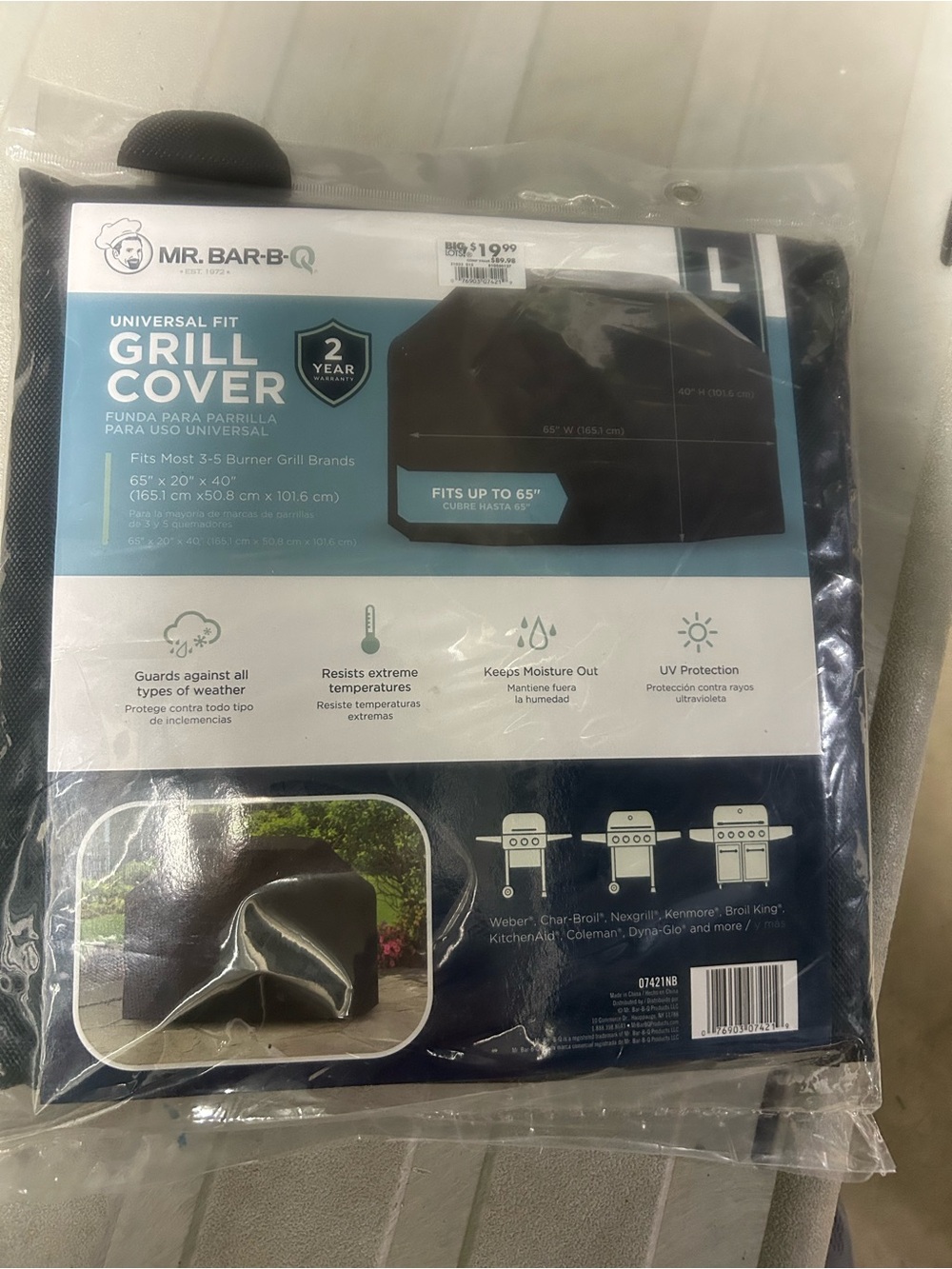 NWT universal outdoor grill cover.